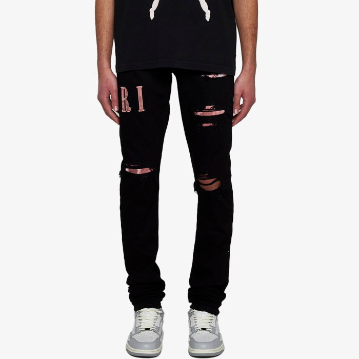 Amiri Logo Embroidered Jeans